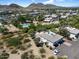 An aerial view showcasing the property's lush surroundings and serene neighborhood setting at 811 E Eugie Ave, Phoenix, AZ 85022