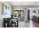 Bright dining area features a sliding glass door leading to an outdoor area, allowing for natural light to fill the space at 811 E Eugie Ave, Phoenix, AZ 85022