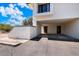 Property featuring a covered parking area and a neatly paved driveway and walkway at 811 E Eugie Ave, Phoenix, AZ 85022