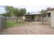 The backyard features a covered patio, and well-maintained landscaping at 8334 N 55Th Ave, Glendale, AZ 85302