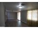 Bonus room featuring neutral walls, light-colored floors, and a glass slider to the backyard at 8334 N 55Th Ave, Glendale, AZ 85302