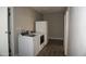 Laundry room featuring a washer, dryer, and a fridge at 8334 N 55Th Ave, Glendale, AZ 85302