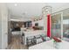 Inviting dining area showcasing seamless flow to the kitchen and living spaces, perfect for entertaining and Gathering meals at 897 E Cherry Hills Dr, Chandler, AZ 85249