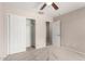 Bedroom featuring a closet, carpet flooring, and a ceiling fan at 9803 N 40Th Dr, Phoenix, AZ 85051