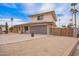 Inviting two-story home featuring a two-car garage and drought-tolerant landscaping at 9803 N 40Th Dr, Phoenix, AZ 85051