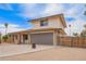 Inviting two-story home featuring a two-car garage and drought-tolerant landscaping at 9803 N 40Th Dr, Phoenix, AZ 85051