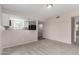Living room featuring an open concept with a partial view of the kitchen at 9803 N 40Th Dr, Phoenix, AZ 85051