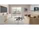 Cozy living room featuring a sliding door to a balcony and contemporary furnishings at 9803 N 40Th Dr, Phoenix, AZ 85051