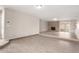 Spacious living room featuring modern floors, brick fireplace, and neutral paint at 9803 N 40Th Dr, Phoenix, AZ 85051