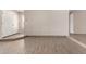 Inviting living room with tile floors, neutral paint, and an entrance with a double front door at 9803 N 40Th Dr, Phoenix, AZ 85051