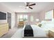Comfortable main bedroom featuring a ceiling fan, closet, and natural light at 9803 N 40Th Dr, Phoenix, AZ 85051