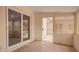 Enclosed patio with brick walls, sliding glass doors, and a secure gate at 9803 N 40Th Dr, Phoenix, AZ 85051