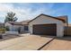 Single-story home with a brown roof, xeriscaped yard and a two-car attached garage with a concrete driveway at 13918 N 78Th Ave, Peoria, AZ 85381