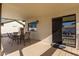 Covered patio with an outdoor dining area, perfect for entertaining or relaxing outdoors at 13918 N 78Th Ave, Peoria, AZ 85381