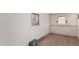 Unfinished basement featuring ply floor, and two windows at 143 W Ray Rd, Chandler, AZ 85225