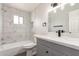 Modern bathroom with white marble style shower and gray vanity at 143 W Ray Rd, Chandler, AZ 85225