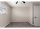 Neutrally painted bedroom with carpet and natural light at 143 W Ray Rd, Chandler, AZ 85225