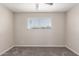 Neutral bedroom features carpet and natural light at 143 W Ray Rd, Chandler, AZ 85225