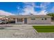 Well-maintained single-story home with low-maintenance desert landscaping at 143 W Ray Rd, Chandler, AZ 85225