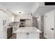 Spacious kitchen features quartz countertops, white cabinets, and stainless steel appliances at 143 W Ray Rd, Chandler, AZ 85225