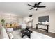 Staged living room featuring an open concept floorplan and modern furnishings at 143 W Ray Rd, Chandler, AZ 85225