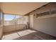 Enclosed patio offering shade and access to the backyard with access to the home's exterior at 143 W Ray Rd, Chandler, AZ 85225