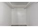 Bright walk-in closet featuring carpet and access panel at 143 W Ray Rd, Chandler, AZ 85225
