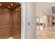 Home elevator with marble floors and a view of the open living space at 1502 E Treasure Cove Dr, Gilbert, AZ 85234