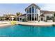 Luxury home featuring an expansive backyard patio with private pool and lake access at 1502 E Treasure Cove Dr, Gilbert, AZ 85234