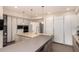 Modern kitchen with a center island, stainless steel appliances, and open layout at 1502 E Treasure Cove Dr, Gilbert, AZ 85234