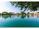 Scenic lake view showcasing waterfront properties, offering a tranquil and picturesque setting at 1502 E Treasure Cove Dr, Gilbert, AZ 85234