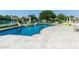 Inviting backyard pool with swim-up bar and lake views, perfect for entertaining at 1502 E Treasure Cove Dr, Gilbert, AZ 85234