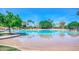 Relaxing pool area with sandy beach entrance and comfortable lounge chairs for residents at 1502 E Treasure Cove Dr, Gilbert, AZ 85234