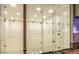 Indoor racquetball court with glass walls, providing a clean and modern space for active recreation at 1502 E Treasure Cove Dr, Gilbert, AZ 85234