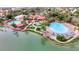 Aerial image of the water park amenities, including a sandy beach and a large pool at 1502 E Treasure Cove Dr, Gilbert, AZ 85234