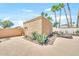 View of backyard exterior with agave plants and lounge chairs at 15226 N 51St St, Scottsdale, AZ 85254