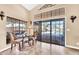 Bright breakfast nook with backyard pool views and light neutral decor, perfect for starting the day at 15226 N 51St St, Scottsdale, AZ 85254