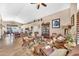 Spacious living room with leather seating, high ceilings, and decorative shelving at 15226 N 51St St, Scottsdale, AZ 85254