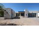 Modern home with stone accents, a glass garage door, and a contemporary design at 1538 W Wagon Wheel Dr, Phoenix, AZ 85021