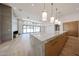 Spacious kitchen with marble island, wood floors, and pendant lighting at 1538 W Wagon Wheel Dr, Phoenix, AZ 85021