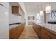 Gourmet kitchen with marble countertops, stainless steel appliances, and hardwood floors at 1538 W Wagon Wheel Dr, Phoenix, AZ 85021