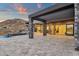Spacious outdoor patio with sleek design, overlooks a pool, and offers breathtaking mountain views at 16119 N Desert Fox Pkwy, Fountain Hills, AZ 85268