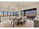 Dining area with mountain views from large windows, with modern chandelier at 16119 N Desert Fox Pkwy, Fountain Hills, AZ 85268