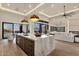 Open kitchen featuring an oversized island, pendant lighting, and scenic outdoor views at 16119 N Desert Fox Pkwy, Fountain Hills, AZ 85268