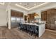 Spacious kitchen with a large island, stainless steel appliances, and seating for several at 16119 N Desert Fox Pkwy, Fountain Hills, AZ 85268