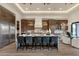 Modern kitchen with stainless steel appliances, a large island, and stylish pendant lights at 16119 N Desert Fox Pkwy, Fountain Hills, AZ 85268