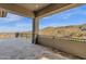 Covered patio with mountain views and iron railing creates a relaxing outdoor space at 16119 N Desert Fox Pkwy, Fountain Hills, AZ 85268