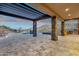 This home features a large patio with travertine tile, outdoor kitchen, firepit, pool, and mountain views at 16119 N Desert Fox Pkwy, Fountain Hills, AZ 85268