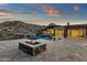 Outdoor living featuring a pool, patio, and firepit for cozy evenings at 16119 N Desert Fox Pkwy, Fountain Hills, AZ 85268