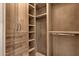 Spacious walk-in closet with custom shelving and ample storage, perfect for organization at 16119 N Desert Fox Pkwy, Fountain Hills, AZ 85268